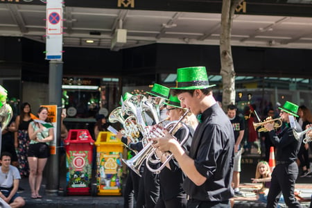 Musicians dressed in green performing during a St. Patrick's Day celebration