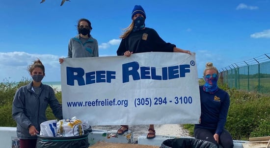 Reef Relief Banner and People