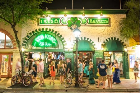 Irish Kevin's Bar illuminated at night on Duval Street in Key West