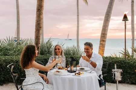 latitudes-dinner - Three people eating outside