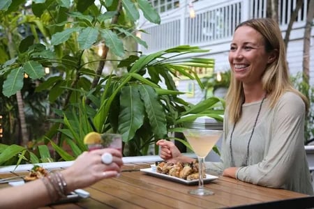 Woman dining at the First Flight restaurant in Key West Florida