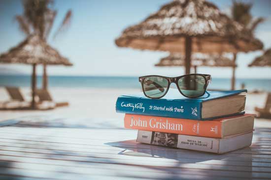 Books and Tiki Huts by the Beach