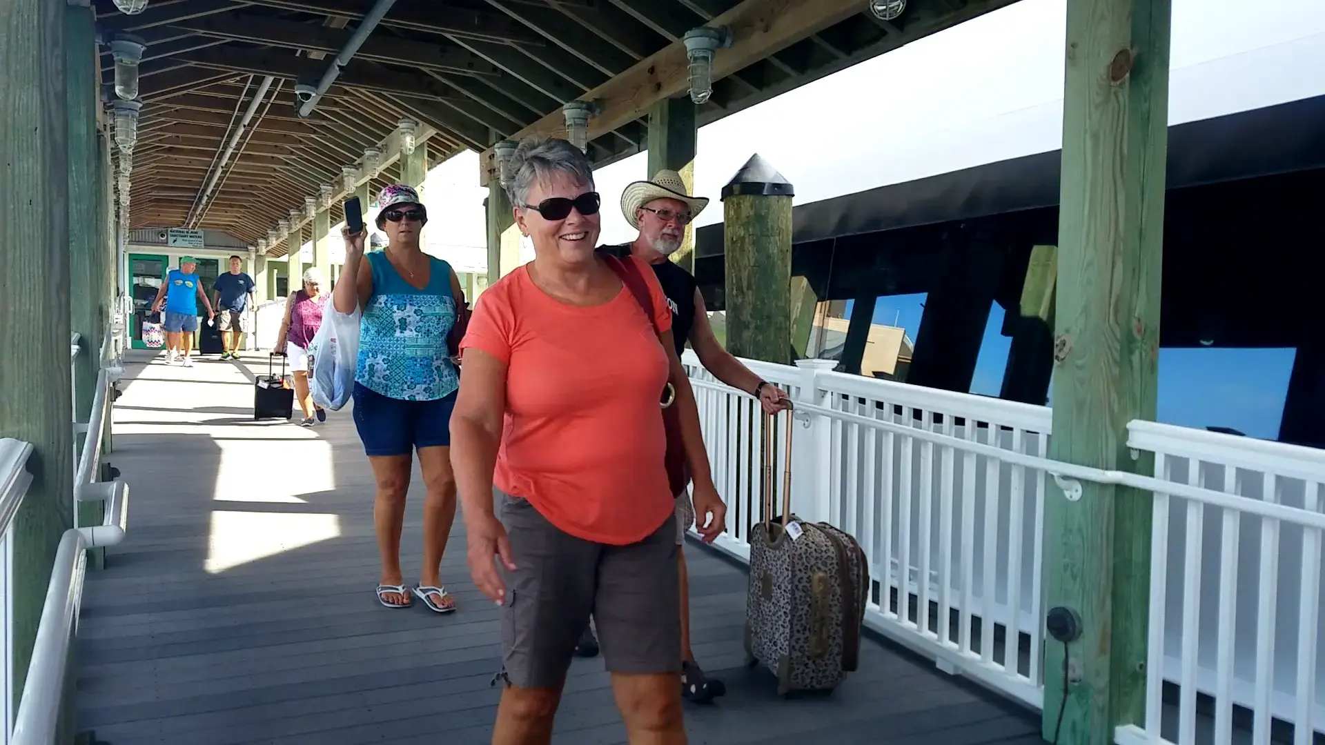 Woman walking along the boarding docks in Key West